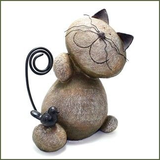 rock-sculpture-river-stones