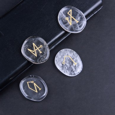 natural clear quartz palm stone archangel symbols